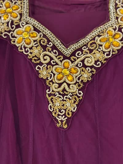 Elegant Purple Net Embroidered Party Wear Dress with Golden Border