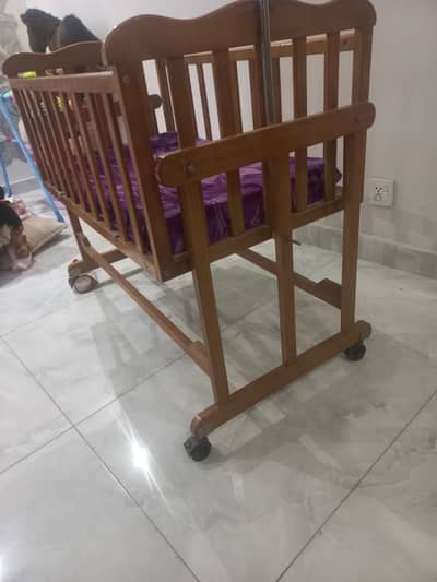 Baby cot available in neat and new condition with mattress included