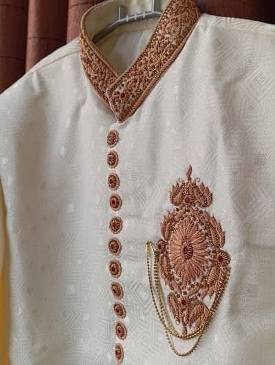 Men’s Wedding Sherwani – Cream/Gold with Ruby Accents