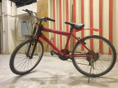 Used Red Mountain Bike - Good Condition, Ready to Ride
