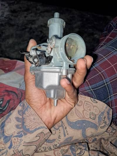 125 Oditor carborator