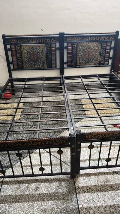 single 2 iron bed
