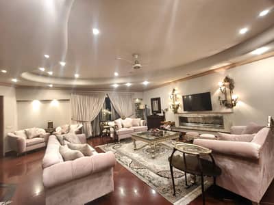 2 KANAL ELEGANT AND FULLY MAINTAINED SUPER HOT LOCATED BUNGALOW IS AVAILABLE IN THE BEST BLOCK OF DHA LAHORE
