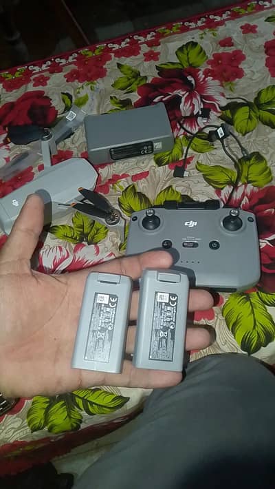 DJI mini2dron  remote controlr . 2batry charging hub bag