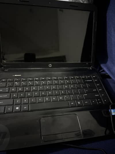 Hp laptop with windows 10 pro and 4gb ram with charger ( read bio )