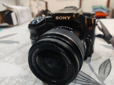 sony alpha a100 dslr camera with 2 lenses only for photos