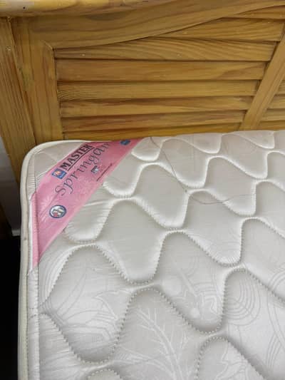 Single beds with mattresses