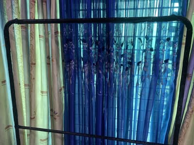 Pure iron made stand for clothes hanging