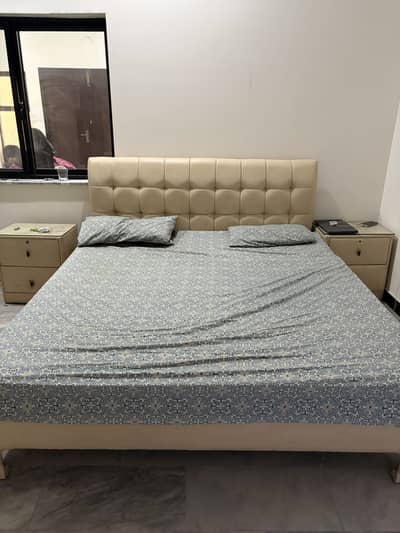 Bed with side tables