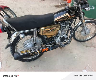 Honda 125 self Gold.