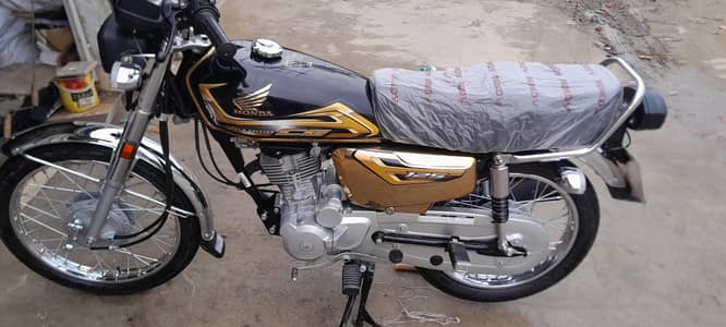 Honda 125 self start gold adition new