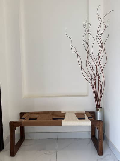 Handmade wooden rope bench