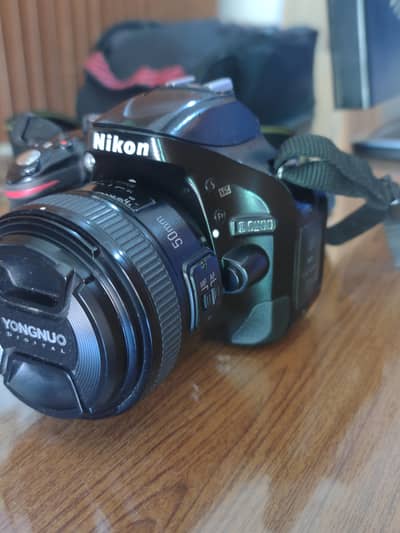 Nikon D5200 with lens and charger