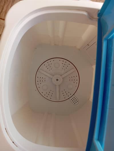 Baby washing machine and dryer.