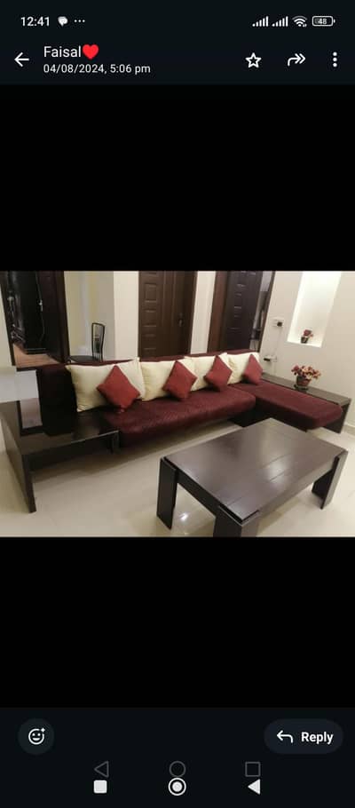 solid wood L shaped sofa in very good condition. .