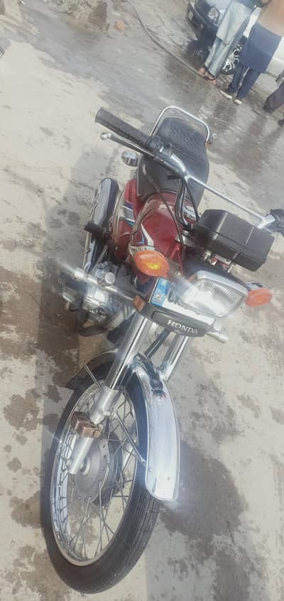 honda 125 ,2023 miodle, islamabad registration, all documents clear