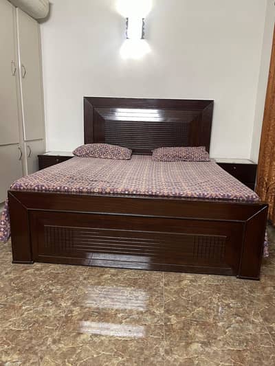 Bed with side tables