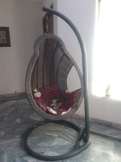 swing chair made of came, fine condition