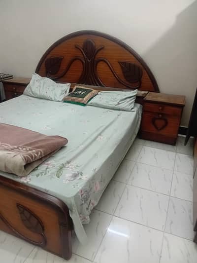 wardrobe double bed and side tables