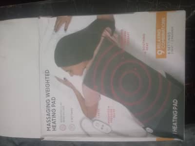 Massaging heating pad