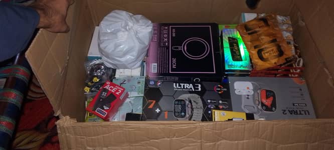 Four box packs of mobile accessories for sale,  200,000.