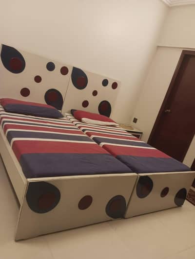 two single beds without mattress 3by6 with cuboard mirror n study tbl