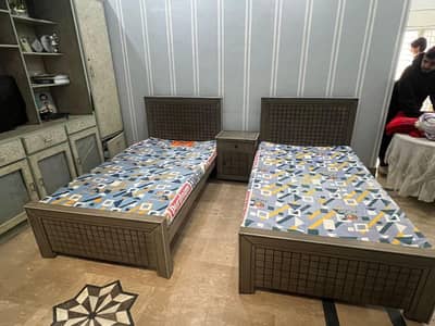 2 single bed one side table with mattress