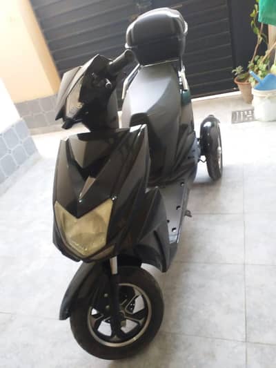 Tri-Wheel Electric Scooty