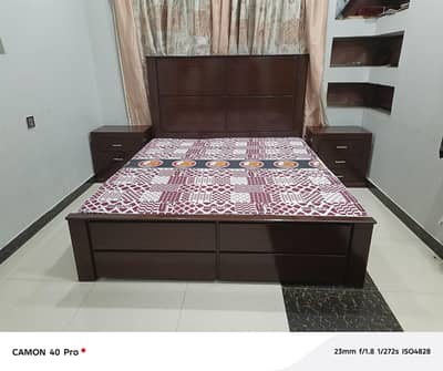 fully wooden bed with big side table with mattress