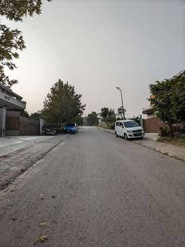 DHA Phase 5, Sector F, Top of the line plot Main Akram Raja blvd , Ideal location to build your home .