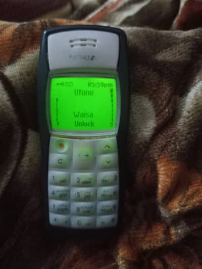 Nokia 1100 mobile phone total genian for sale