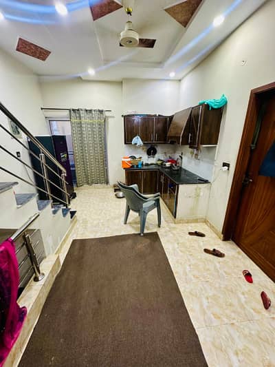 Swa 2 Marla double story house walking distance from wahdat Road orange line station