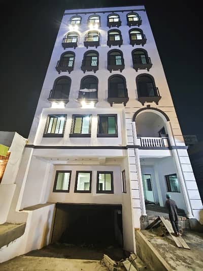 DOUBLE COMMERCIAL BUILDING WITH BIG HALLS, M/F WASHROOMS, KITCHEN, VAST PARKING, NEAR BUSINESS COMMUNITY HUB