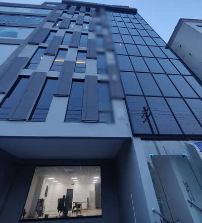 DOUBLE COMMERCIAL BUILDING NEAR CANAL, EMPORIUM MALL 3 FLOORS, VAST PARKING, MAIN ROAD