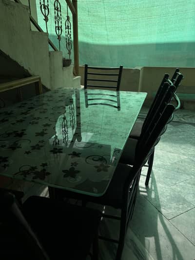 Glass Top dining table with 6 chairs available  for Sale