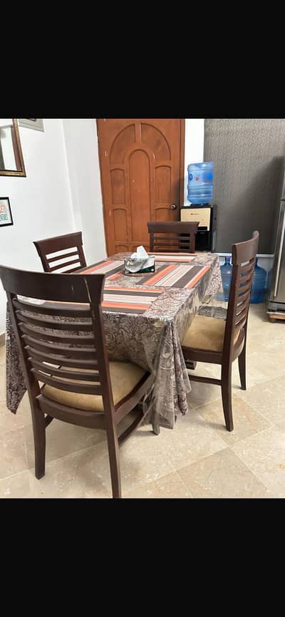 Glass dining table with 4 wooden chairs