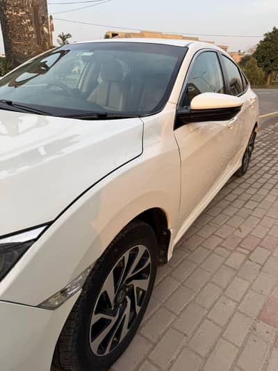 HONDA CIVIC UG FULLL OPTION NEEND MONEY