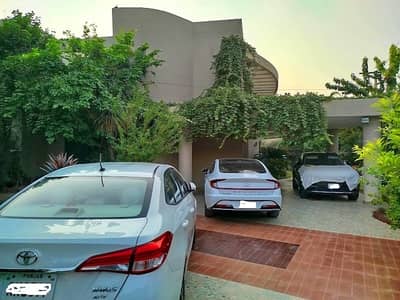 Cheapest 1.5 Kanal old house with beautiful lawn NFC Society