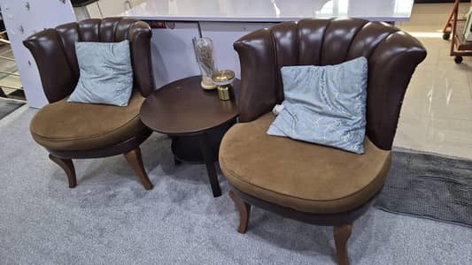pair of Elegant Scalloped Accent chairs withmatching side table
