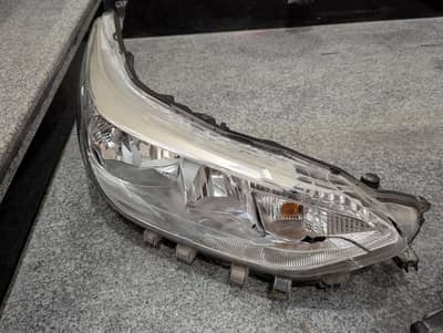 Toyota Yaris Pakistan Geniune 'as' new headlights & Front Grill