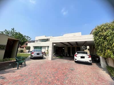 2 Kanal Slightly Used Modern Design Like A Brand New House For Sale In DHA Phase 2 Block R Near To Park Masjid & Commercial Market.