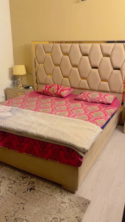 King size bed set with coffee chairs and table