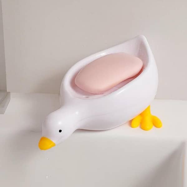 Duck-shaped soap box and plastic soap rack with drainage for bathroom basins