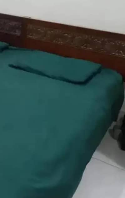 one single bed in wooden