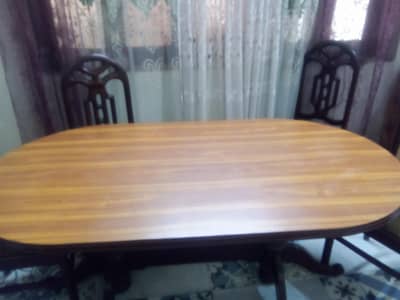 wooden dining table with 6 chairs