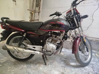 Honda deluxe 125 total original bike Multan