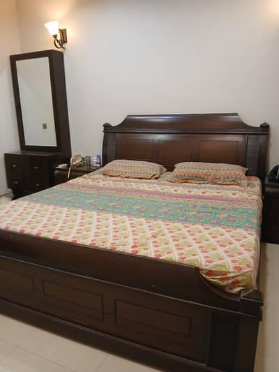 Bed set includes mattress with side table