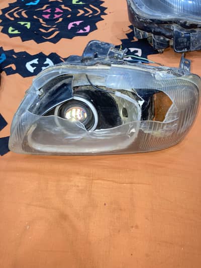 Baleno Headlights and civic 1996 original steering