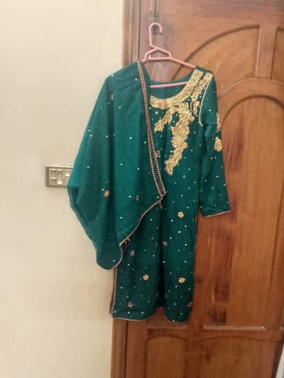 Selling a beautiful dark green formal 3-piece suit.