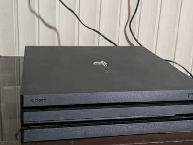 PS4 pro 1TB with 2 Original Controllers
